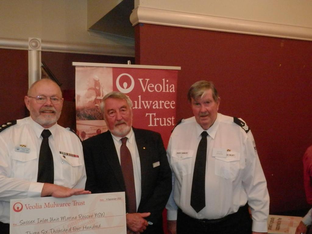 John Lang, Unit Commander (L) and David Tarbert (R) of Marine Rescue Sussex Inlet with Paul Stephenson OAM, Chairman Veolia Mulwaree Trust. photo copyright Ken McManus taken at  and featuring the  class