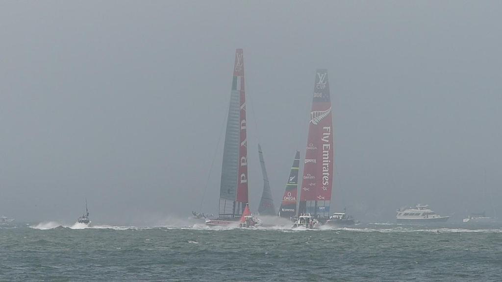 Emirates Team NZ and Luna Rossa in the fog on San Francico Bay on Day 2 of the Finals of the Louis Vuitton Cup photo copyright John Navas  taken at  and featuring the  class