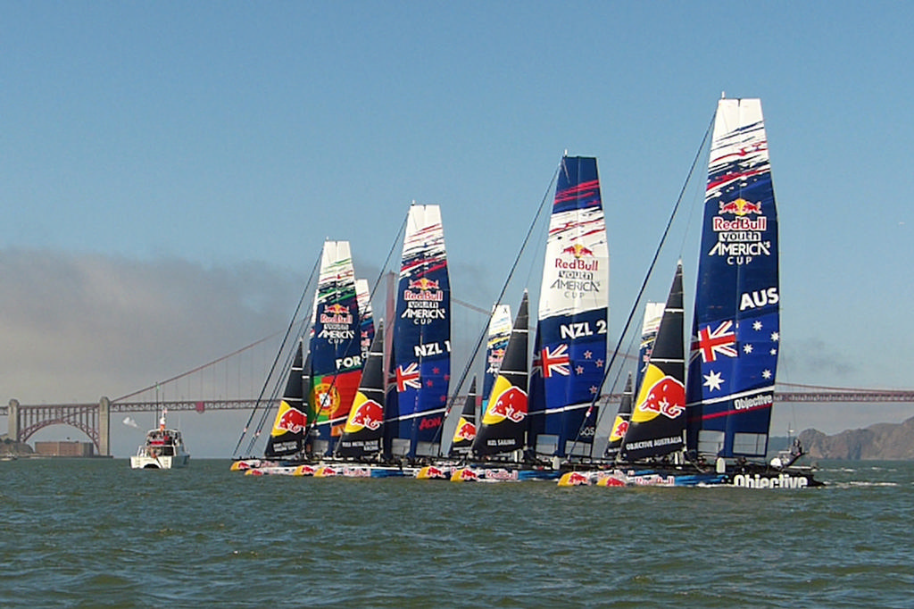 Portugal, New Zealand, and Australia hit the line at Start of race 7. [smoke from shotgun visible] - Red Bull Youth AC © John Navas 