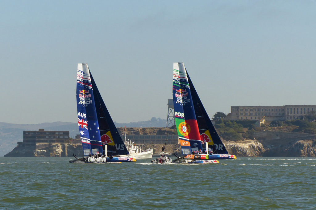 Australia and Portugal battling downwind past Alcatraz Island. - Red Bull Youth AC © John Navas 