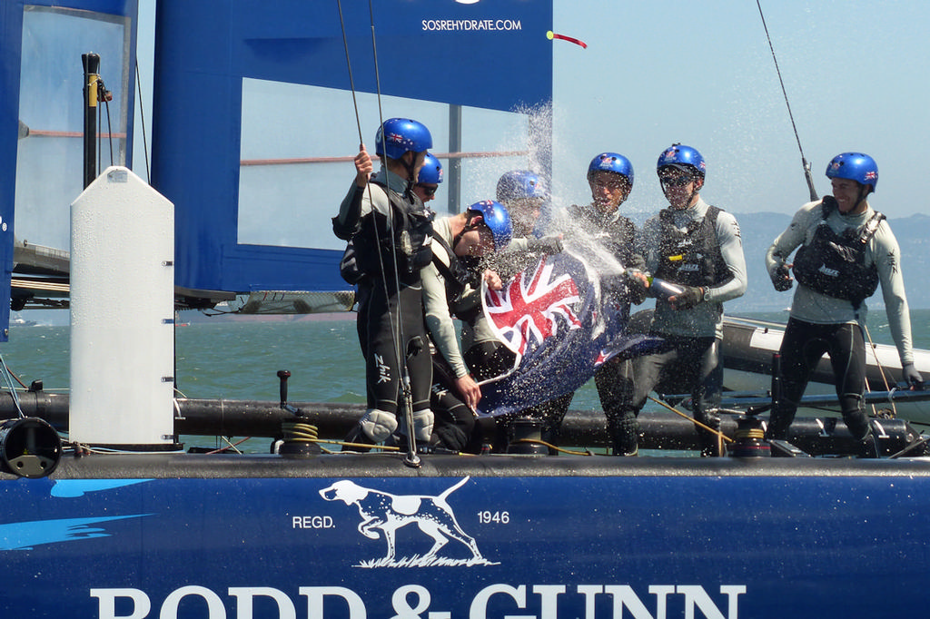 NZL Sailing Team celebrates win in champagne tradition. - America's Cup © John Navas 