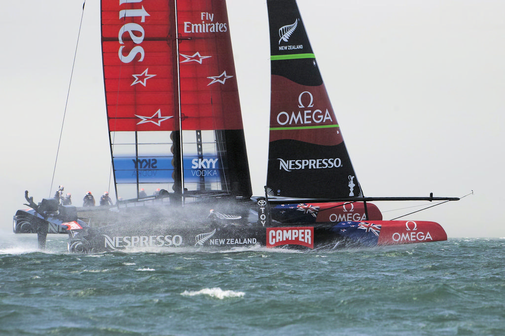 Emirates Team NZ getting up to speed. The new shrouded bowsprit can be seen. - America’s Cup © Chuck Lantz http://www.ChuckLantz.com