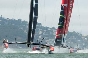 Oracle Team USA and Emirates Team New Zealand cross the start of race five on day three of the America's Cup 34.  San Francisco. 10/9/2013 photo copyright Chris Cameron/ETNZ http://www.chriscameron.co.nz taken at  and featuring the  class