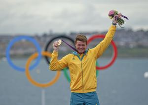 Tom Slingsby with his Gold medal at the 2012 Olympics photo copyright  Photo on Edition taken at  and featuring the  class