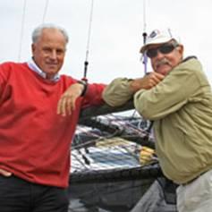 America&rsquo;s Cup Regatta Director Iain Murray (l.) talks old times with fellow Aussie and  18&rsquo; Skiff veteran John (Woody) Winning photo copyright Rich Roberts http://www.UnderTheSunPhotos.com taken at  and featuring the  class