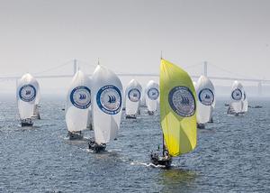 Larchmont YC (USA) leading the fleet with the Newport Pell Bridge in the background photo copyright  Rolex/Daniel Forster http://www.regattanews.com taken at  and featuring the  class