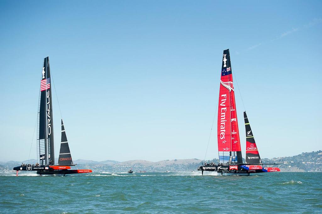 Emirates Team New Zealand NZL5 leads Oracle Team USA on the second leg of race 11 on day seven of America&rsquo;s Cup 34 photo copyright Emirates Team New Zealand http://www.etnzblog.com taken at  and featuring the  class