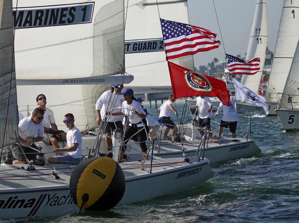 U.S. Marine Corps Team 1 (foreground) get a great start in the final race of the day. Marines Team 1 took third place in the 2013 Patriot Regatta. © Rick Roberts