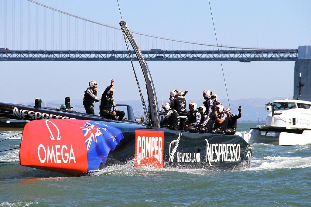 Oracle Team USA v Emirates Team New Zealand. America's Cup Day 6 San Francisco. Emirates Team NZ crew acknowledge their fans at the finish of Race 10 photo copyright Richard Gladwell www.photosport.co.nz taken at  and featuring the  class