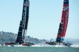 Emirates Team New Zealand and Oracle Team USA manouver for starting positions for race ten on day six of America's Cup 34. 15/9/2013 photo copyright Chris Cameron/ETNZ http://www.chriscameron.co.nz taken at  and featuring the  class