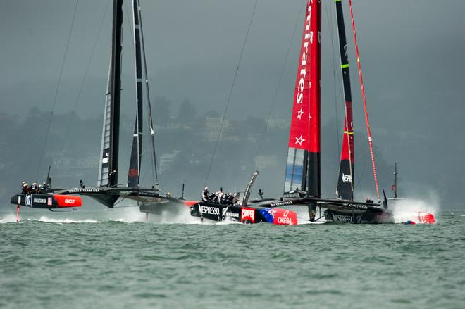 Emirates Team New Zealand and Oracle Team USA in the restart for race 13. The 1st attempt was called off after the 40 minute time limit was reached. America’s Cup 34. 20/9/2013 © Chris Cameron/ETNZ http://www.chriscameron.co.nz