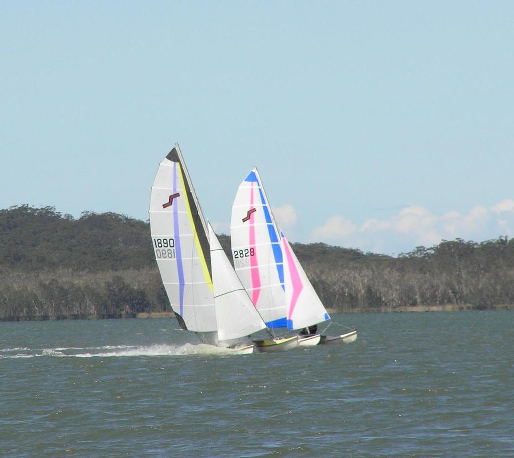 Rohan Nosworthy (1890) and Krystal Weir (2828) battling it out downwind in Heat 3 - Maricat 2013/14 NSW State Titles photo copyright Martina Holt taken at  and featuring the  class
