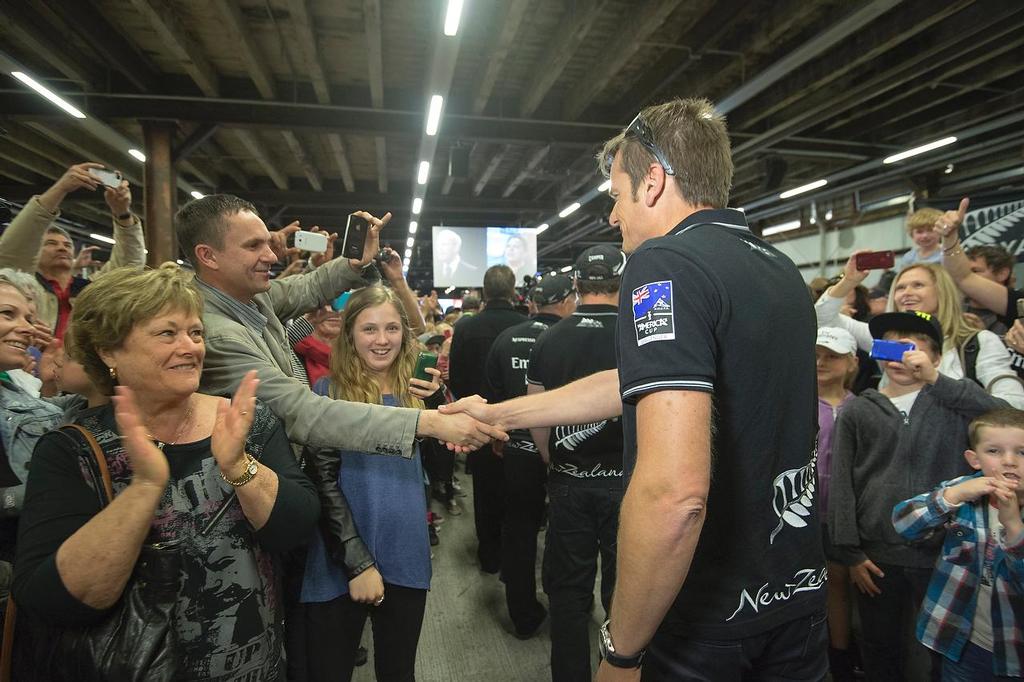 Emirates Team New Zealand welcome home event in Auckland. Dean Barker shakes hands with fans as the team enters shed 10. 4/10/2013 photo copyright Chris Cameron/ETNZ http://www.chriscameron.co.nz taken at  and featuring the  class