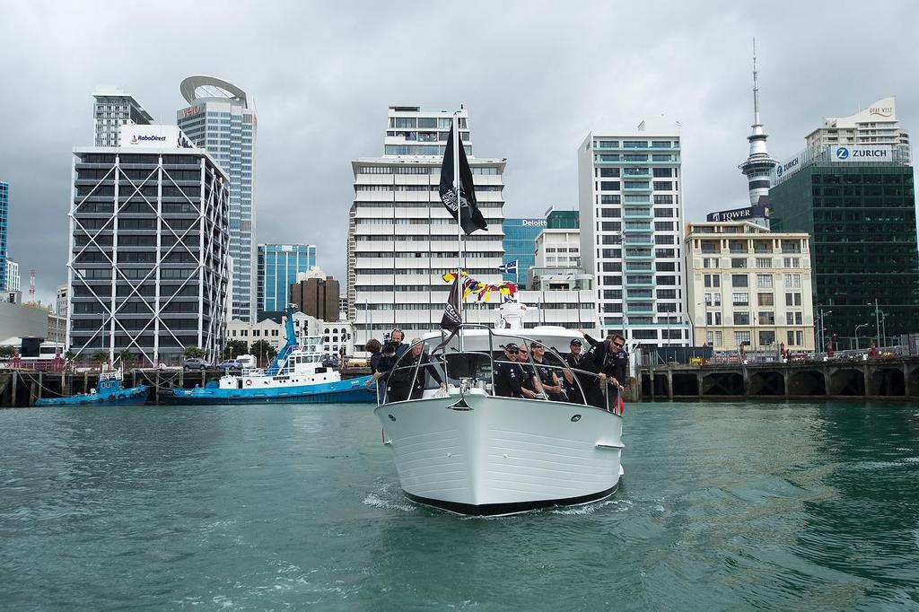 Emirates Team New Zealand welcome home event in Auckland. Team members wave to supporters lining the docks and The Viaduct from a flotilla. 4/10/2013 photo copyright Chris Cameron/ETNZ http://www.chriscameron.co.nz taken at  and featuring the  class