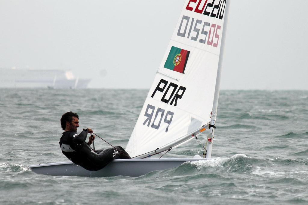 Gustavo Lima POR Laser - 2013 ISAF Sailing World Cup Qingdao photo copyright ISAF  taken at  and featuring the  class