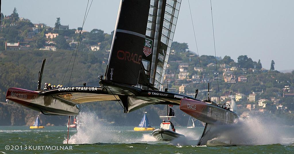 Oracle Team USA at pace - America’s Cup - Day 14 photo copyright Kurt Molnar taken at  and featuring the  class