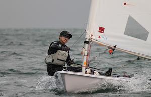 China's Lijia Xu works hard in the breeze - 2013 ISAF Sailing World Cup Qingdao photo copyright ISAF  taken at  and featuring the  class