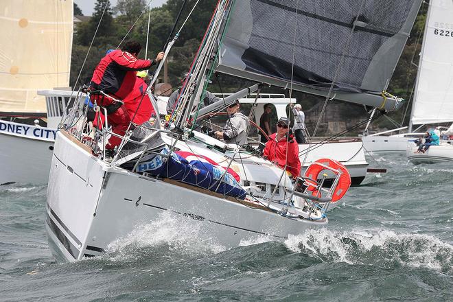 Gotta love a well prepared crew - this bowman even had the smock on before the start. Good choice! - 2013 Beneteau Cup ©  John Curnow