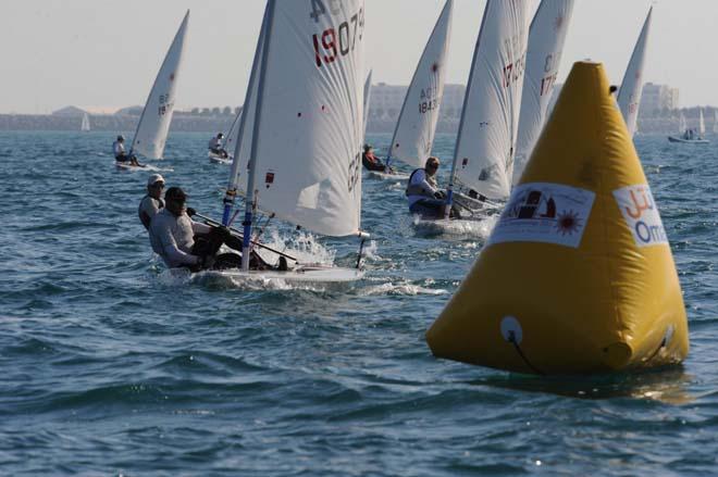 Competitors in action during the 2013 Laser Master World Championships ©  Munther Al Zadjali http://omanlaserworlds2013.com/