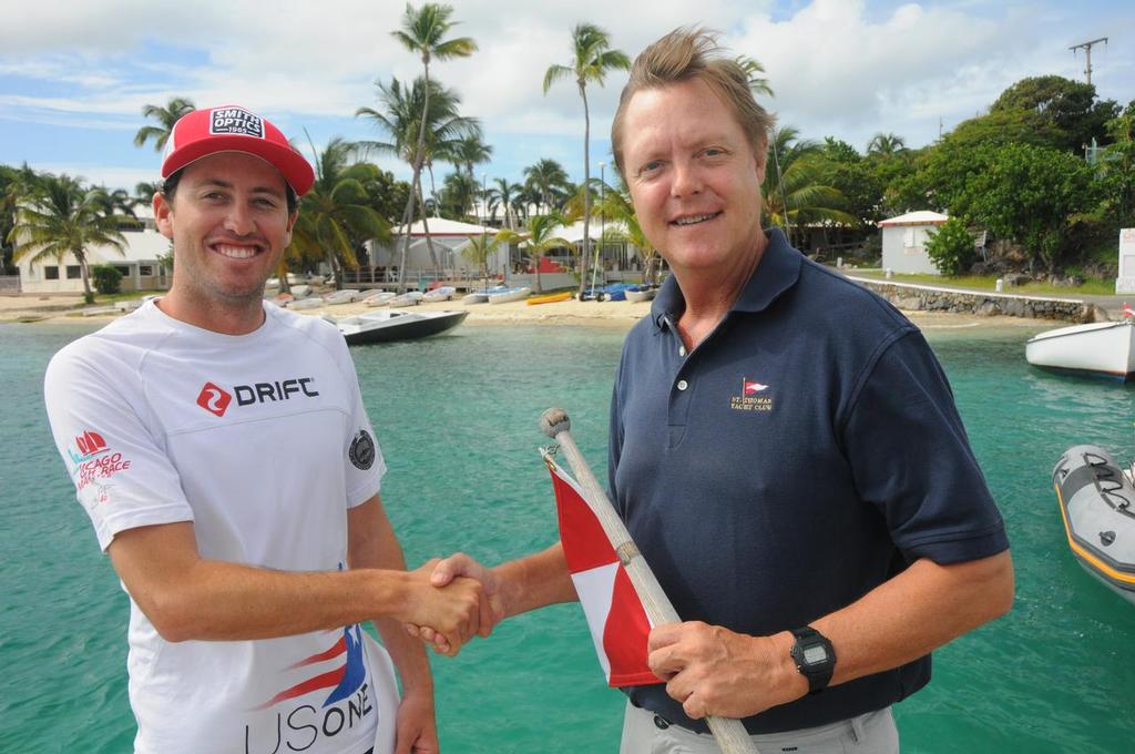L to R: Taylor Canfield, Virgin Islands Sailor of the Year for 2013, Phillip Shannon, President of the Virgin Islands Sailing Association, with the iconic St. Thomas Yacht Club in the background. photo copyright Dean Barnes taken at  and featuring the  class
