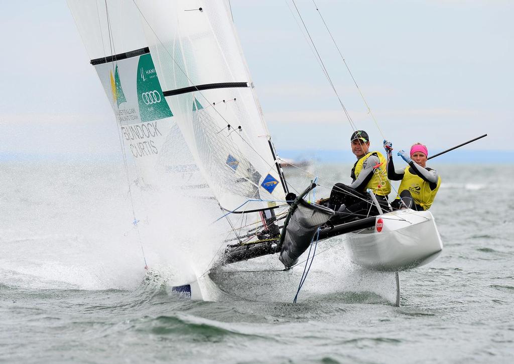 Darren Bundock and Nina Curtis (AUS) win the Nacra 17 at the ISAF Sailing World Cup Melbourne © Jeff Crow/Sail Melbourne http://www.sportlibrary.com.au