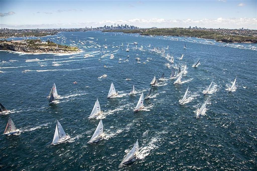Fleet leaving Sydney Harbour after start of 69th Rolex Sydney Hobart photo copyright  Rolex/Daniel Forster http://www.regattanews.com taken at  and featuring the  class