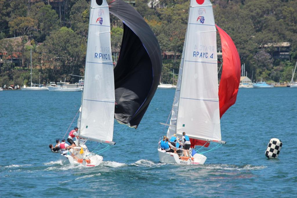 Downwind duelling into the finish line as penalties played out in an exciting match between Clare Costanzo (RPAYC) and Zac Pullen (RYCT) © Damian Devine