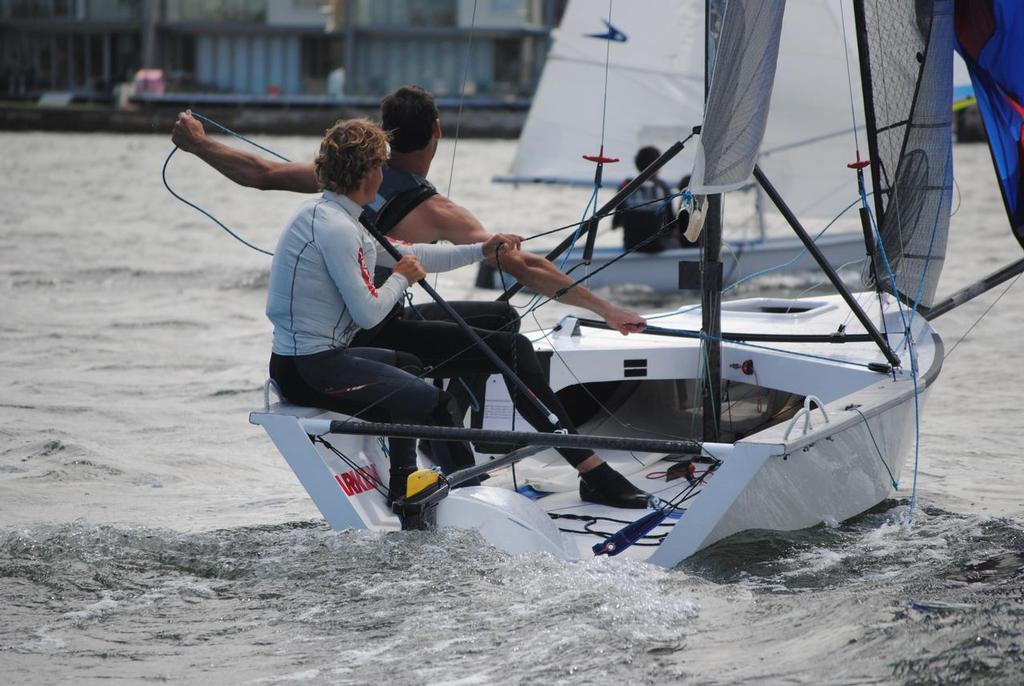 Matt Rhys-Jones and Dan Grilk sailing The French Tickler work hard to bridge a gap downwind. - 2013-14 NSW Cherub State Championships © Carol Stephenson