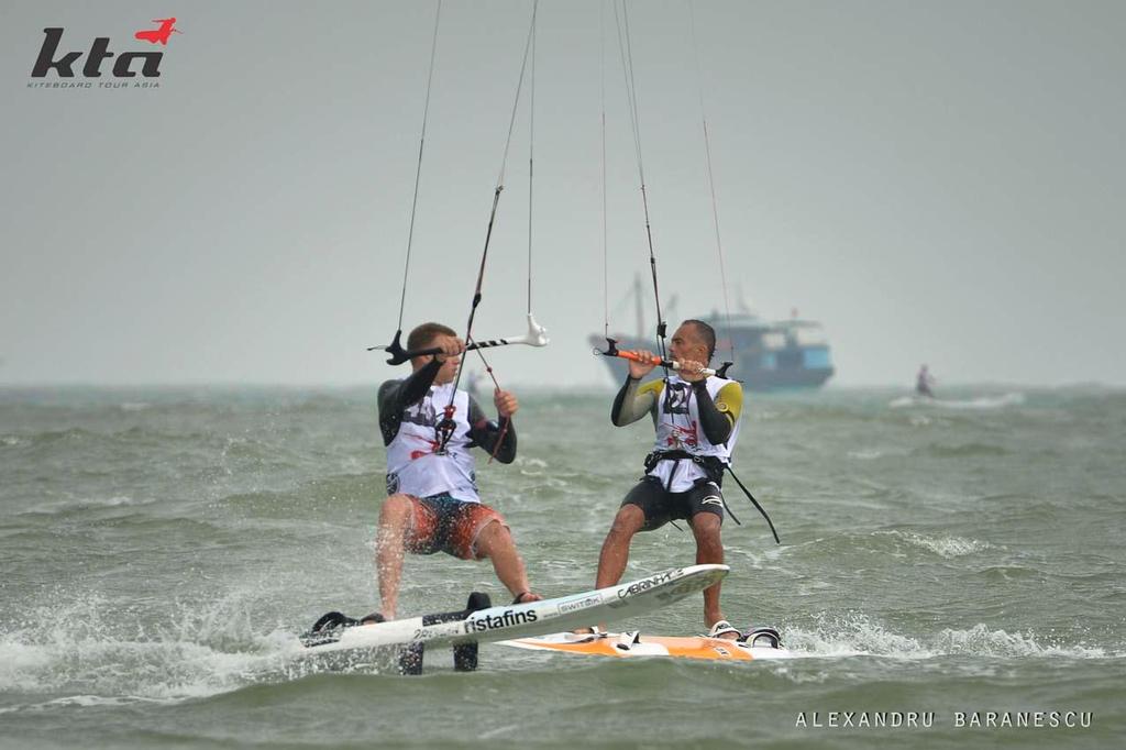 Brian Kender from Usa and Simone Vanucci from Italy in action during day two of the IKA Kiteboard Race World Championship 2013 on November 21, 2013 at King Bay Qionghai, China. © Alexandru Baranescu