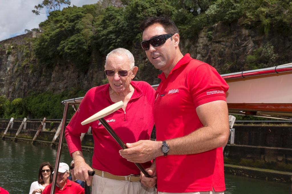 Good luck charm: Bob Oatley presents Wild Oats XI skipper, Mark Richards, with a good luck charm – his favourite walking stick.  2013 Rolex Sydney Hobart Race. photo copyright Andrea Francolini taken at  and featuring the  class