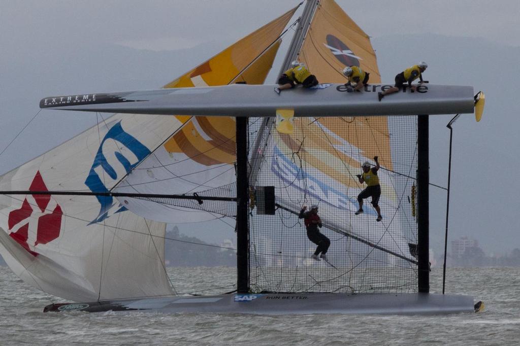 SAP Extreme Sailing Team capizes in Act 8 of the Extreme Sailing Series © Søren Wiegand Kristensen