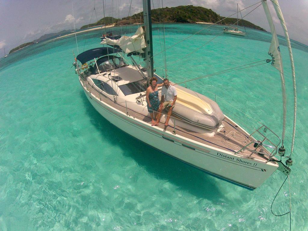 Sheryl and Paul Shard aboard their Southerly 49 sailboat, Distant Shores II, in the Tobago Cays. © Sheryl Shard