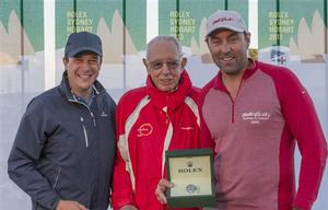 Bob Oatley, Owner of Wild Oats XI, and Skipper Mark Richards receive the Rolex Yacht-Master timepiece for Line Honours from Patrick Boutellier, Rolex Australia photo copyright  Rolex / Carlo Borlenghi http://www.carloborlenghi.net taken at  and featuring the  class