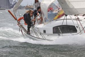 Bet you did not think you were going to get photographed making the woman do all the work... You go Sista! - 2013 Beneteau Cup photo copyright  John Curnow taken at  and featuring the  class