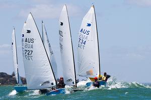 Some of the fleet surfs around the Wing Mark. - OK Dinghy Australian and Interdominion Championships photo copyright  Alex McKinnon Photography http://www.alexmckinnonphotography.com taken at  and featuring the  class