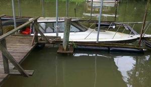 Photo of a submerged boat at a dock
 photo copyright Vic Winebarger taken at  and featuring the  class