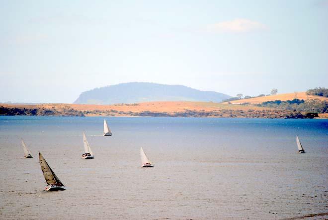 Betsey looms in the background as the fleet tacks down the Derwent © Peter Campbell