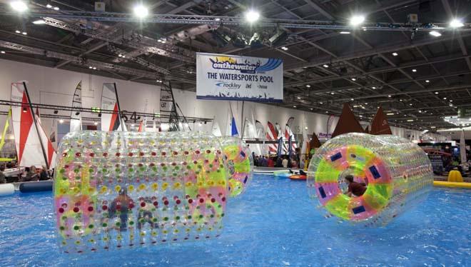 Children enjoying The Watersports Pool in the Holidays, Dinghies & Watersports Area at the London Boat Show 2014, ExCeL, London. © onEdition http://www.onEdition.com