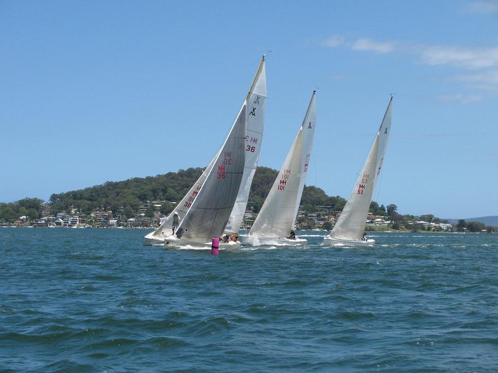 Approaching a mark closely together on picturesque Brisbane Water. - Adams 10 National Championships photo copyright Mo Goodship taken at  and featuring the  class