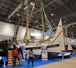 Visitors on the Cornish Crabber stand at the London Boat Show 2014, ExCeL, London. photo copyright onEdition http://www.onEdition.com taken at  and featuring the  class