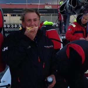 Gary Smith, skipper of line honours winner The Fork in the Road enjoys a sponsor's pie after finishing the tough race - Launceston to Hobart Yacht Race 2013 photo copyright Shaun Tiedemann taken at  and featuring the  class
