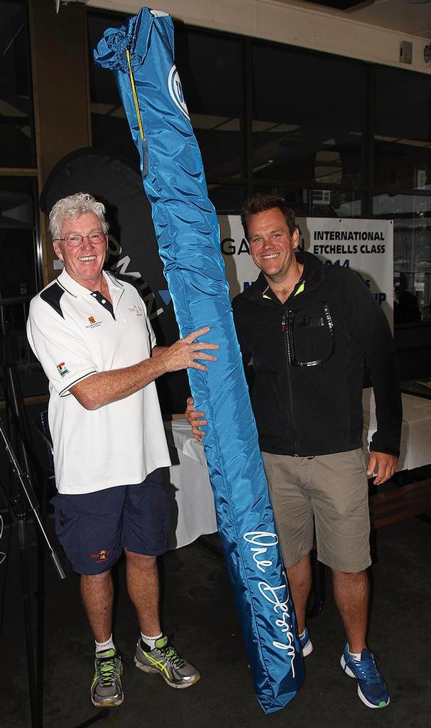 Roger Hickman receives his new jib from North Sails’, Andrew Gavenlock. - Garmin NSW Etchells Championship photo copyright  John Curnow taken at  and featuring the  class