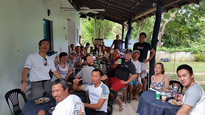 Sailors enjoying Edgy Veggy dishes (plus adobo and bonitos tuna from a different store) at a charming Tali B&B! © Jose Sehwani Gonzales
