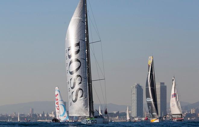 The Barcelona World Race 2014-2015. Picture from the race start today - Hugo Boss IMOCA Open 60 skippered by Alex Thomson (GBR) with Co skipper Pepe Ribes (ESP). © Lloyd Images