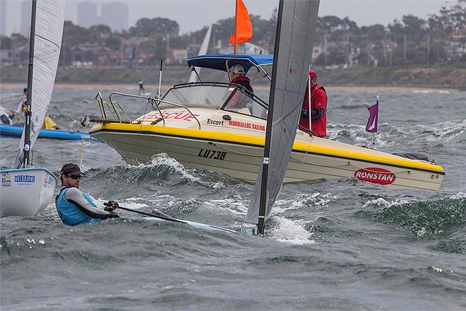 Just after the start in the Finn Medal Race, when the seaway was running at about 1.5m. Oil Tweddell in one of the ditches. - 2014 ISAF Sailing World Cup, Melbourne. ©  John Curnow