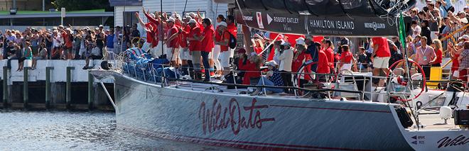 Gracious in victory; the Wild Oats XI crew cheer the arrival of Comanche into Constitution Dock © Crosbie Lorimer http://www.crosbielorimer.com