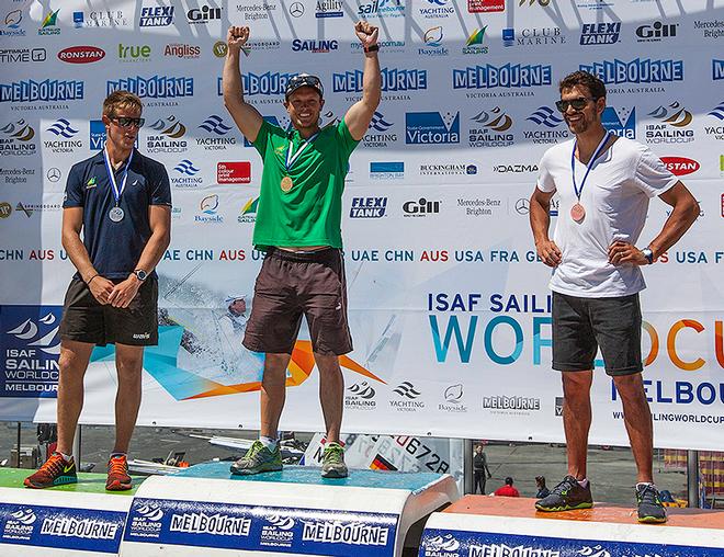 Matt Wearn, Tom Burton and Michael Bullot were chuffed, but subdued on the podium after the Medal Race in the Laser.. - 2014 ISAF Sailing World Cup, Melbourne. ©  John Curnow