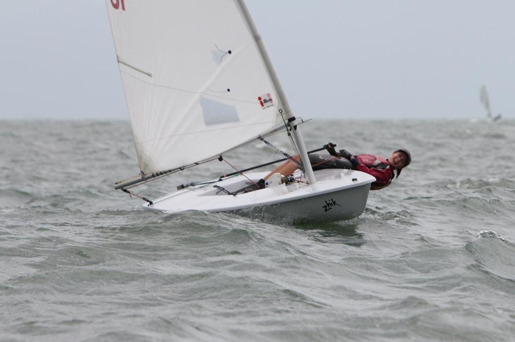 Day 2, Emma Barsi from the Townsville sailing club sailing a Laser 4.7. - Zhik Mission Beach Regatta photo copyright Thomas Orr taken at  and featuring the  class