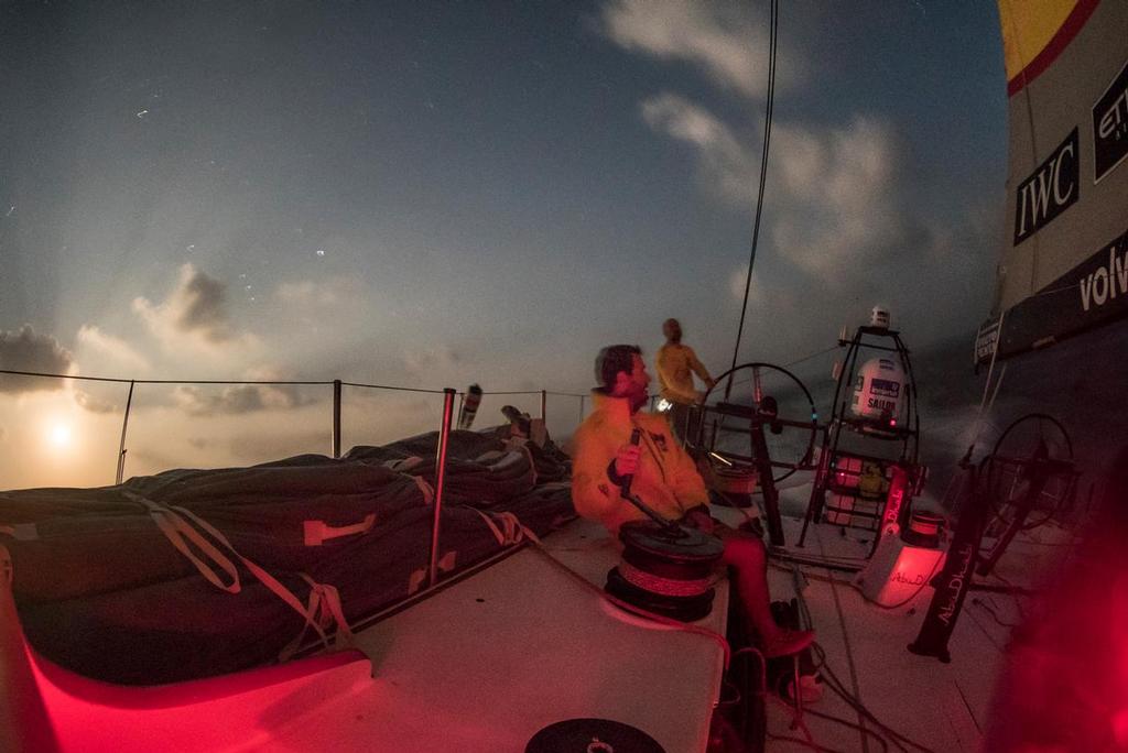December 8, 2014. Leg 2 onboard Abu Dhabi Ocean Racing. Night sailing under the moonlit clouds for watch team 1. © Matt Knighton/Abu Dhabi Ocean Racing