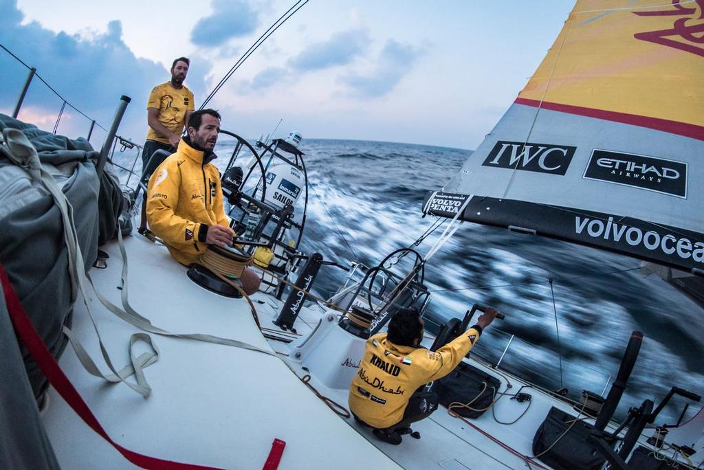 December 9, 2014. Leg 2 onboard Abu Dhabi Ocean Racing. The sun starts to rise for Abu Dhabi as they chase down Brunel and Dongfeng. © Matt Knighton/Abu Dhabi Ocean Racing
